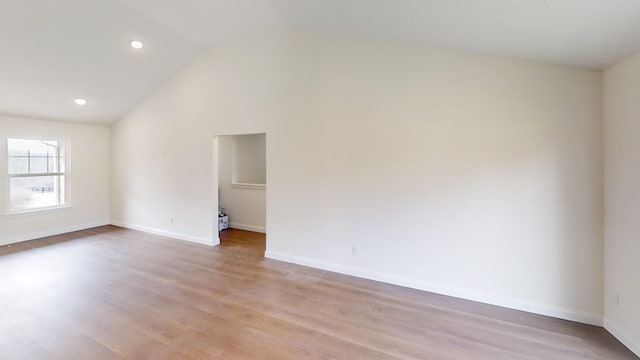 110 Liza Ln, Crittenden, KY 41030 - unfurnished room with lofted ceiling, light wood finished floors, and recessed lighting