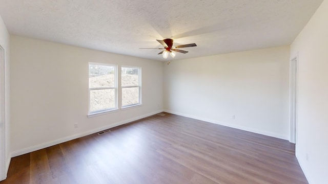 110 Liza Ln, Crittenden, KY 41030 - unfurnished room featuring a ceiling fan, dark wood-style flooring, and a textured ceiling