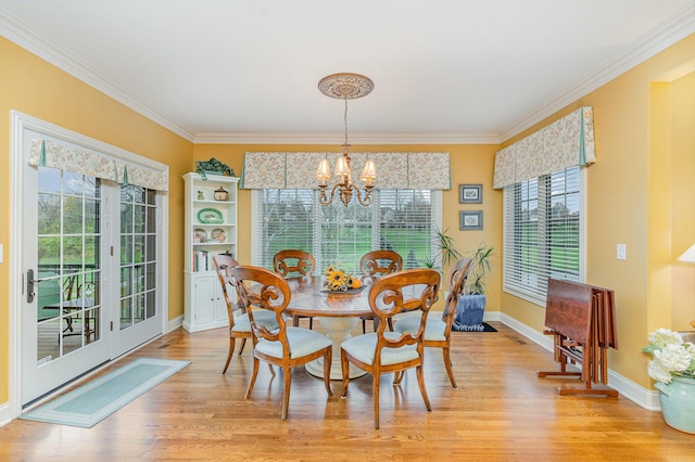 1007 Campo Ct, Union, KY 41091 - dining room with crown molding, a chandelier, light wood finished floors, and healthy amount of natural light