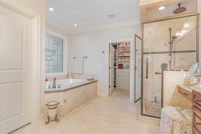 1007 Campo Ct, Union, KY 41091 - full bathroom featuring a stall shower, a garden tub, crown molding, a walk in closet, and tile patterned flooring