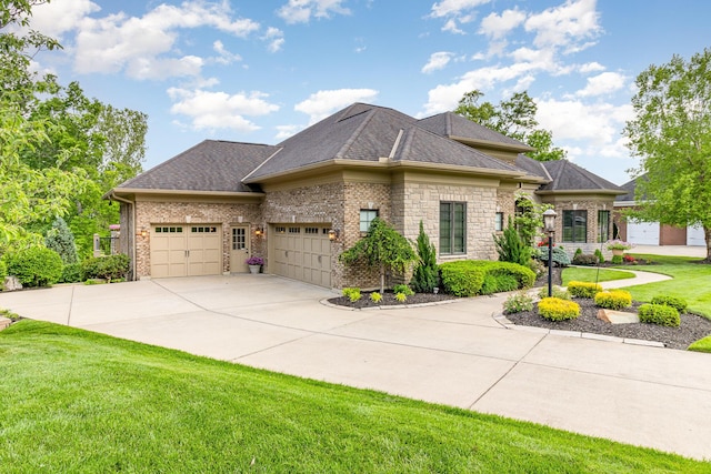 1007 Campo Ct, Union, KY 41091 - view of side of home with an attached garage, a yard, concrete driveway, roof with shingles, and stone siding
