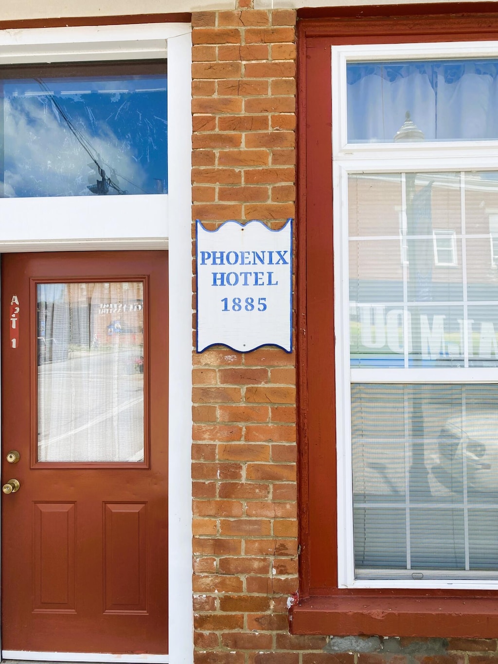 300 Main St, Falmouth, KY 41040 - doorway to property with brick siding