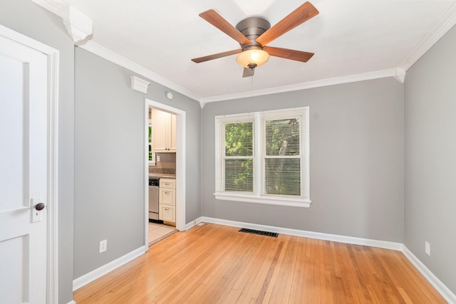 65 Beech Dr, Edgewood, KY 41017 - unfurnished bedroom featuring light wood-style flooring, crown molding, connected bathroom, and a ceiling fan