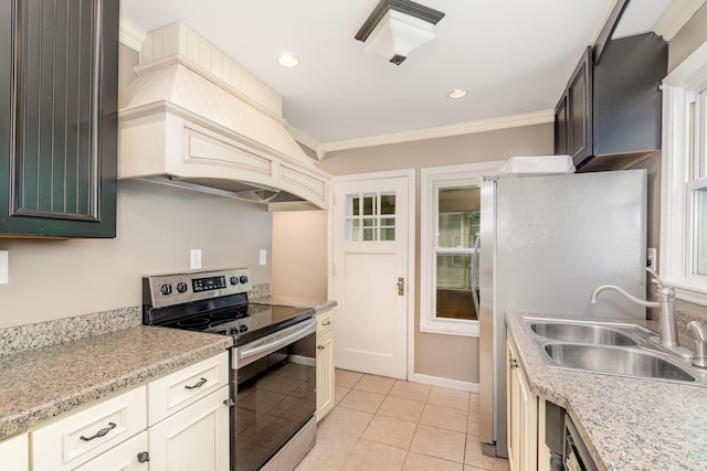 65 Beech Dr, Edgewood, KY 41017 - kitchen with electric range, ornamental molding, light tile patterned flooring, light countertops, and custom range hood