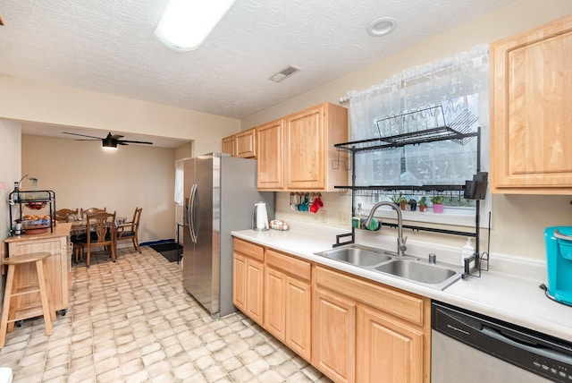 1845 Conrad Ln, Burlington, KY 41005 - kitchen with stainless steel appliances, light brown cabinets, light flooring, and light countertops