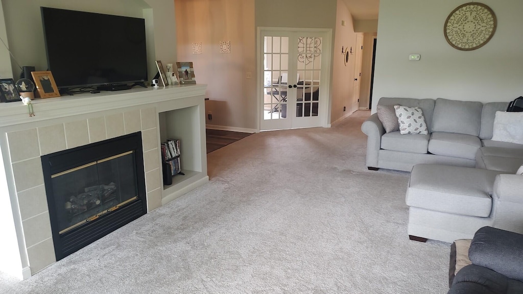 852 Flint Rdg Unit 4-302, Cold Spring, KY 41076 - living area featuring carpet floors and a tiled fireplace