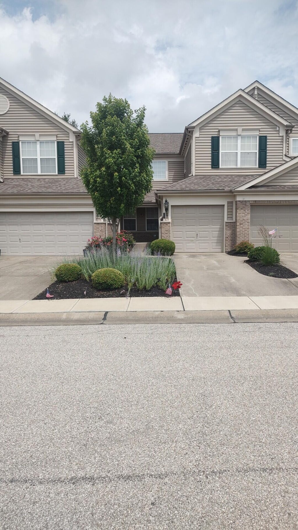 852 Flint Rdg Unit 4-302, Cold Spring, KY 41076 - view of front of property with brick siding, concrete driveway, and a garage