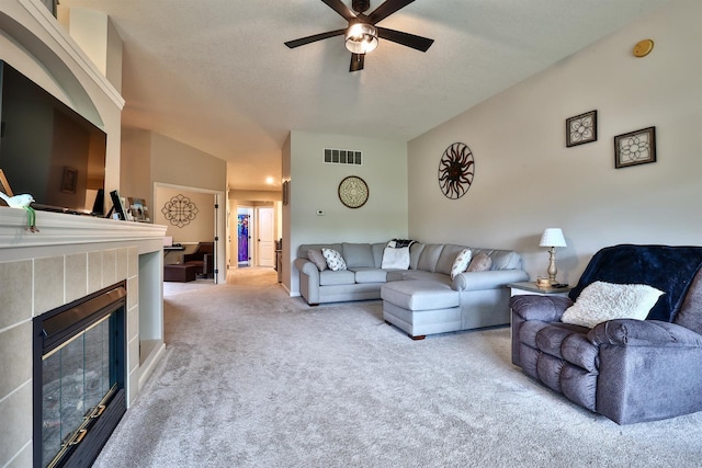 852 Flint Rdg Unit 4-302, Cold Spring, KY 41076 - carpeted living room featuring a ceiling fan, a fireplace, and vaulted ceiling
