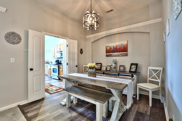 852 Flint Rdg Unit 4-302, Cold Spring, KY 41076 - dining room featuring a chandelier and dark wood finished floors