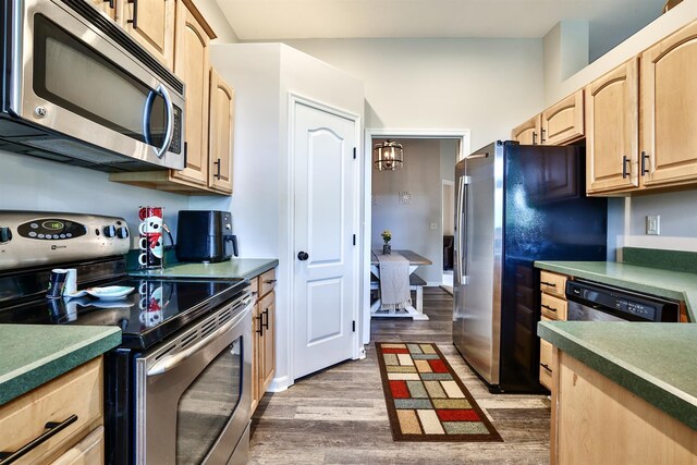 852 Flint Rdg Unit 4-302, Cold Spring, KY 41076 - kitchen with stainless steel appliances, light brown cabinets, and dark wood-style floors
