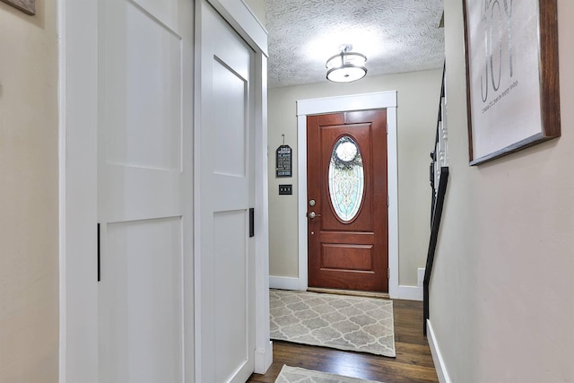 328 Creekwood Dr, Edgewood, KY 41017 - entryway featuring dark wood-style flooring and a textured ceiling