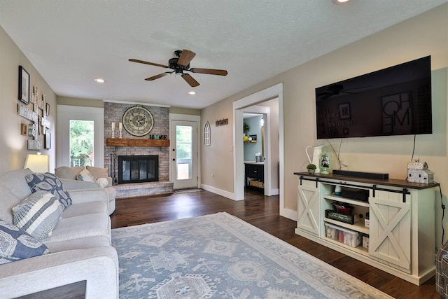 328 Creekwood Dr, Edgewood, KY 41017 - living room with ceiling fan, dark wood finished floors, a brick fireplace, and recessed lighting