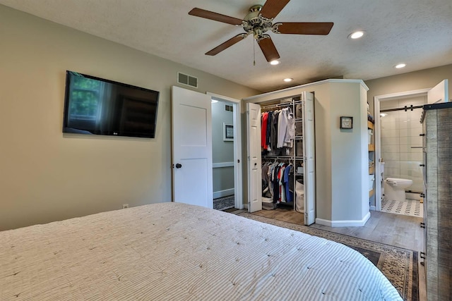 328 Creekwood Dr, Edgewood, KY 41017 - bedroom with wood finished floors, recessed lighting, a closet, connected bathroom, and ceiling fan