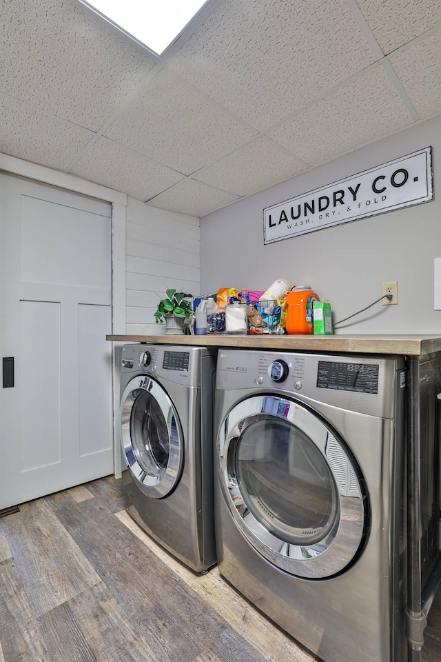 328 Creekwood Dr, Edgewood, KY 41017 - washroom featuring washing machine and clothes dryer and wood finished floors