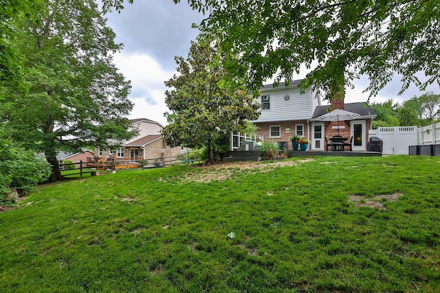 328 Creekwood Dr, Edgewood, KY 41017 - rear view of house featuring brick siding and a fenced backyard