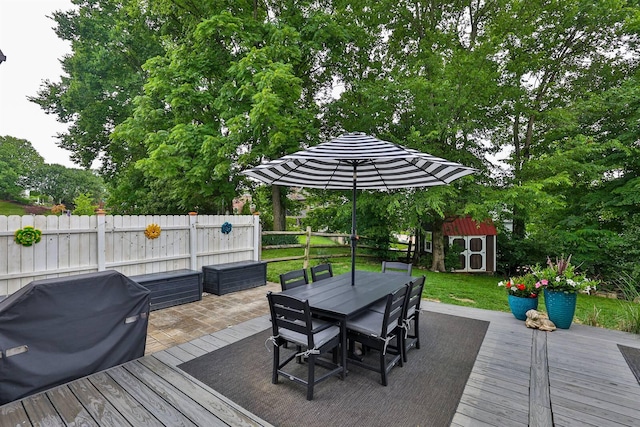 328 Creekwood Dr, Edgewood, KY 41017 - wooden terrace with a storage unit, outdoor dining area, and area for grilling
