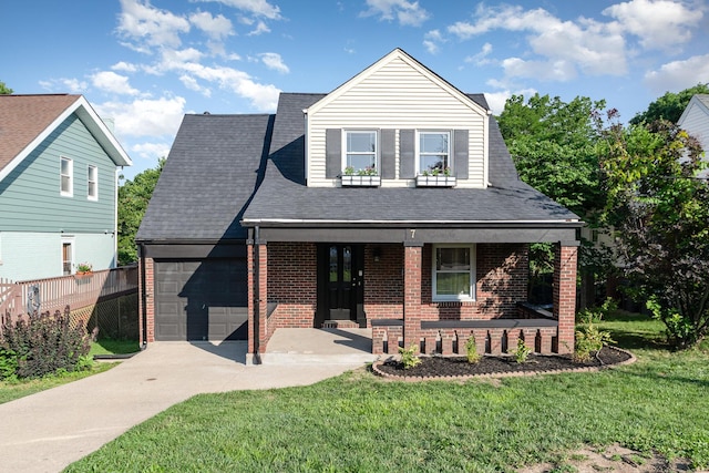 7 Ross Ave, Fort Mitchell, KY 41017 - view of front of home featuring covered porch, brick siding, a garage, and concrete driveway
