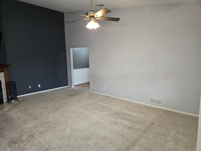 10 Meadow Ln Unit 9, Highland Heights, KY 41076 - unfurnished living room with carpet, ceiling fan, and a fireplace with flush hearth