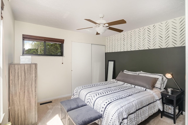 1006 Nob Hill Dr, Fort Thomas, KY 41075 - carpeted bedroom with an accent wall, a closet, and ceiling fan