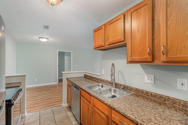 10602 Christa Ct Unit 6, Alexandria, KY 41001 - kitchen with stainless steel appliances, brown cabinets, and light tile patterned floors
