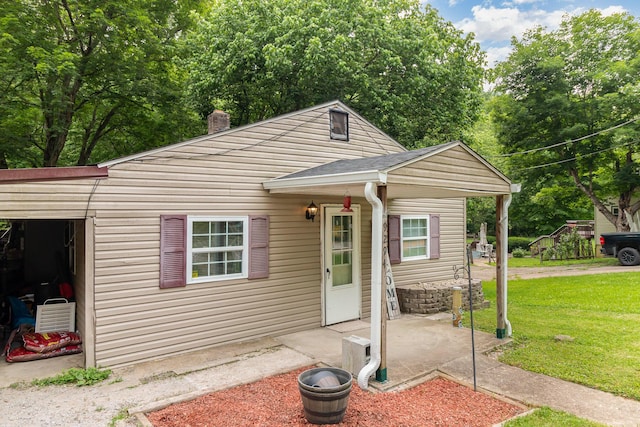 9294 Marshall Rd, Covington, KY 41015 - bungalow with a front lawn and a chimney