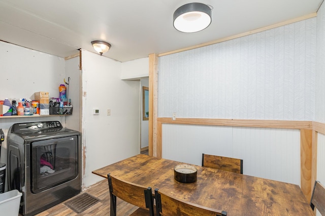 9294 Marshall Rd, Covington, KY 41015 - laundry area featuring washing machine and dryer and wood finished floors