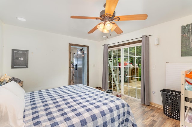 9294 Marshall Rd, Covington, KY 41015 - bedroom featuring access to exterior, wood finished floors, and ceiling fan
