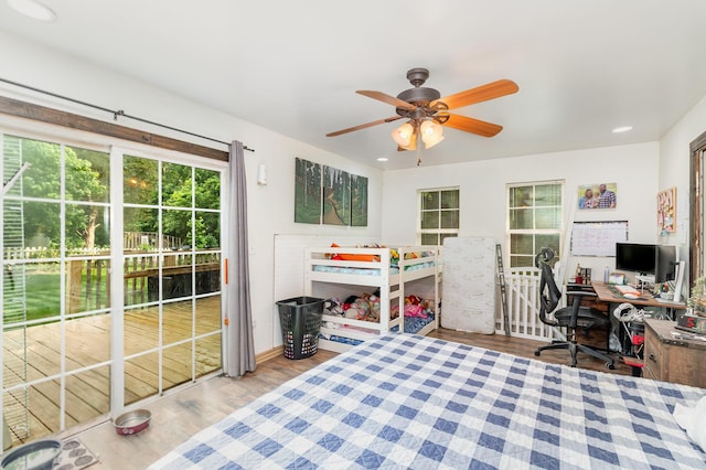 9294 Marshall Rd, Covington, KY 41015 - bedroom with a desk, wood finished floors, and a ceiling fan