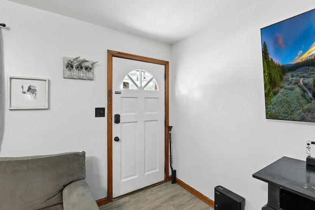50 Russell St, Florence, KY 41042 - foyer with light wood-type flooring and baseboards