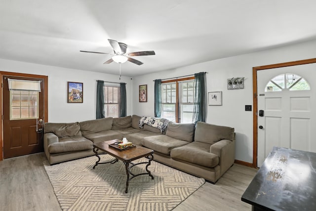 50 Russell St, Florence, KY 41042 - living area featuring light wood-style flooring, plenty of natural light, and a ceiling fan