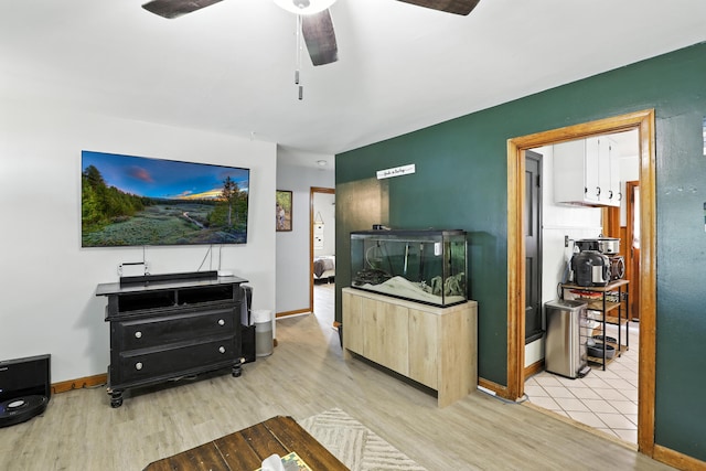 50 Russell St, Florence, KY 41042 - living area with a ceiling fan and wood finished floors