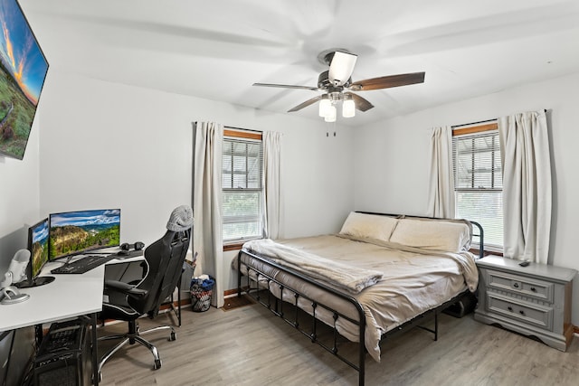 50 Russell St, Florence, KY 41042 - bedroom featuring light wood-type flooring, a desk, and a ceiling fan