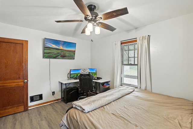 50 Russell St, Florence, KY 41042 - bedroom with wood finished floors, a desk, and a ceiling fan