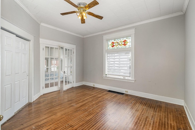 3712 Park Ave, Covington, KY 41015 - unfurnished bedroom featuring multiple windows, crown molding, wood-type flooring, and ceiling fan