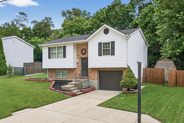1212 Leslie Marie Ct, Elsmere, KY 41018 - split foyer home with an attached garage, driveway, brick siding, a shed, and view of scattered trees
