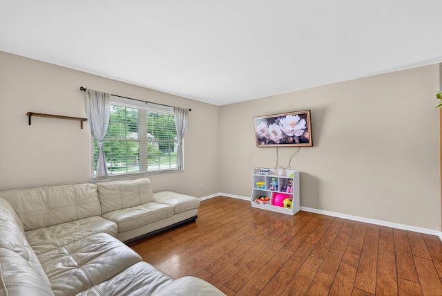 1212 Leslie Marie Ct, Elsmere, KY 41018 - living area with wood-type flooring and baseboards