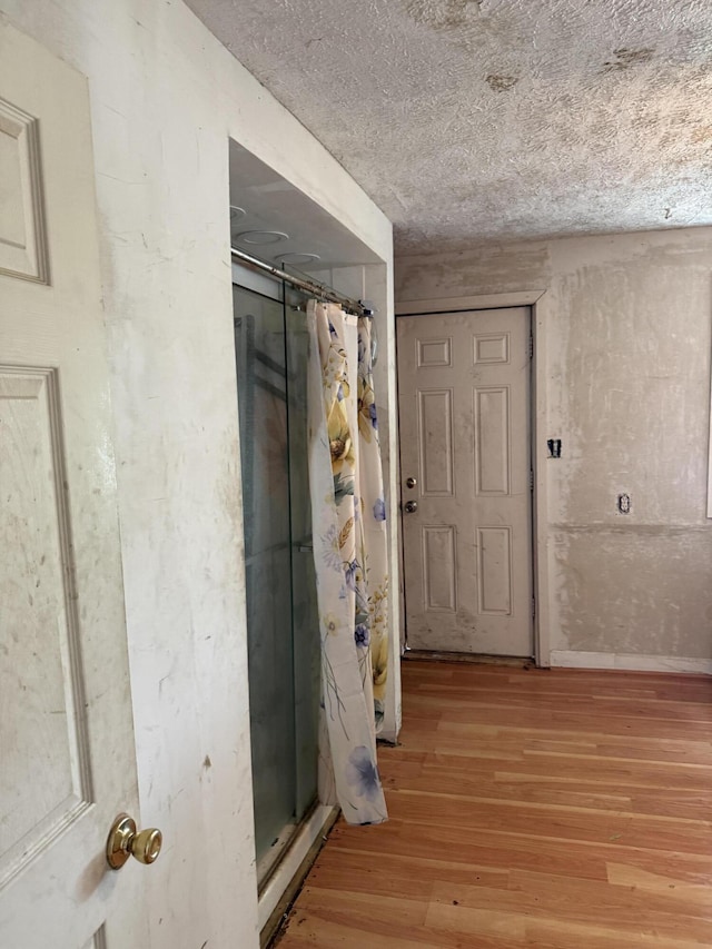 3057 Front St, Petersburg, KY 41080 - corridor featuring light wood-type flooring and a textured ceiling
