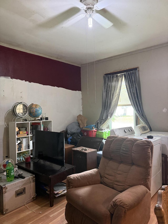 3057 Front St, Petersburg, KY 41080 - living area with washer and clothes dryer, wood finished floors, and a ceiling fan