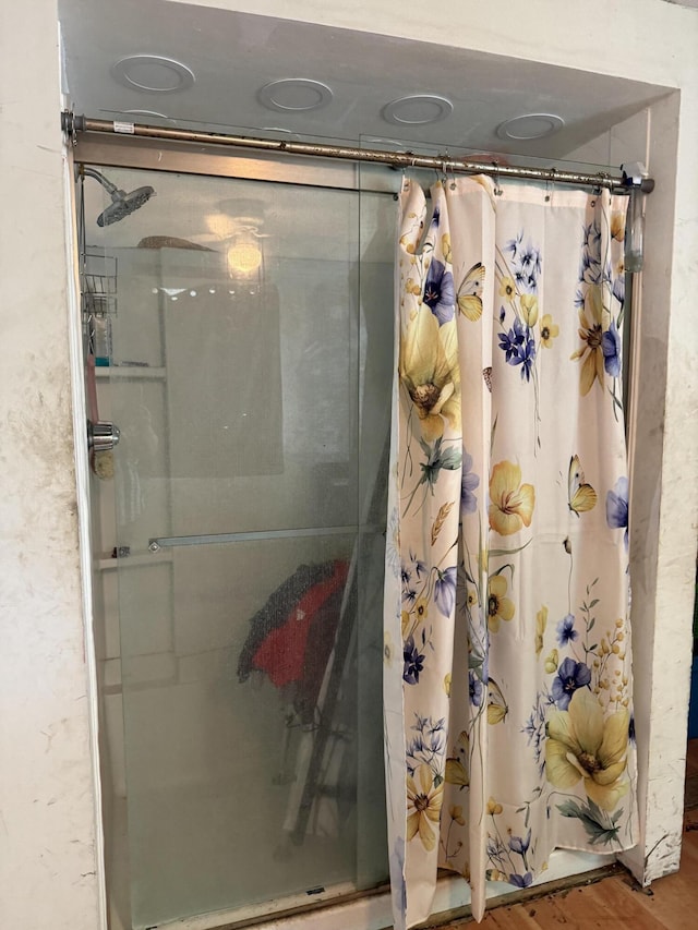 3057 Front St, Petersburg, KY 41080 - bathroom featuring a shower stall and wood finished floors