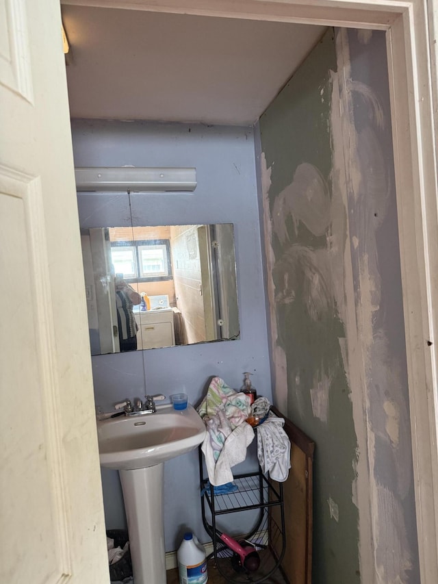 3057 Front St, Petersburg, KY 41080 - bathroom featuring washer / dryer and a sink