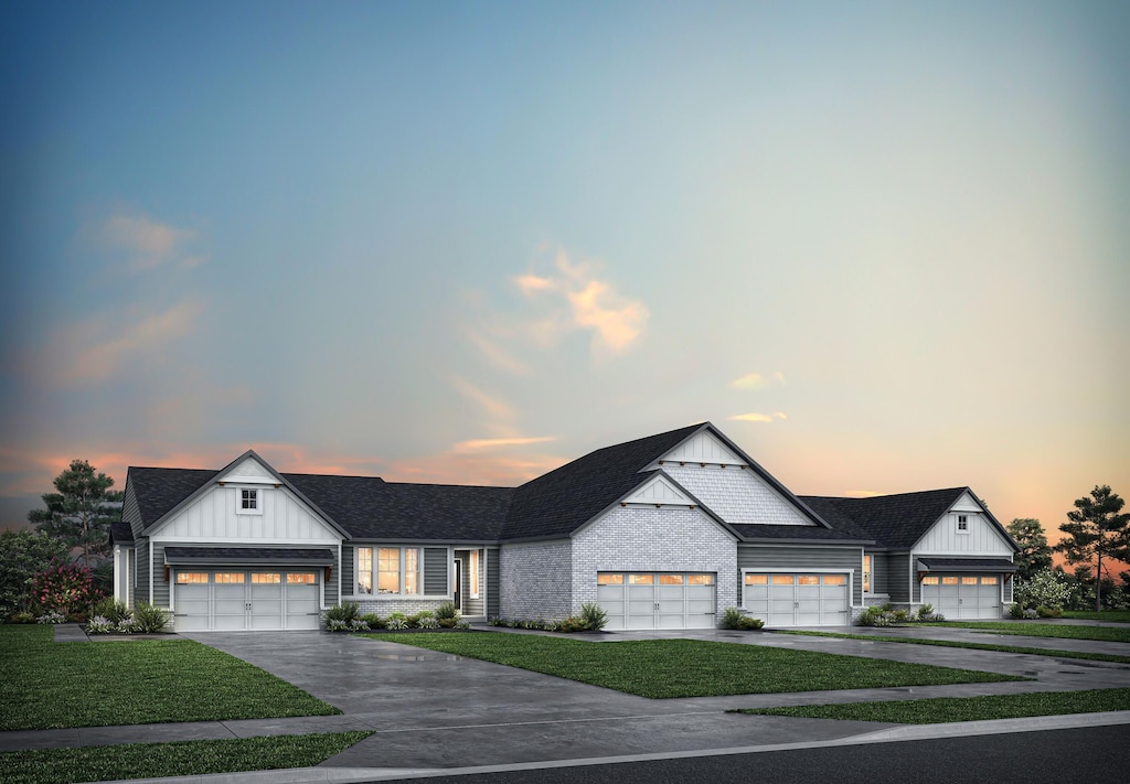 8312 Bluff Dr Unit 32C, Alexandria, KY 41001 - modern farmhouse featuring board and batten siding, a yard, concrete driveway, and a shingled roof