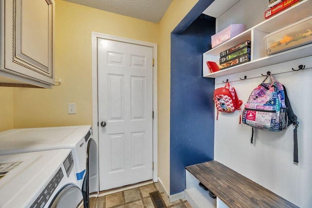 9128 Belvedere Ct, Florence, KY 41042 - laundry room with washing machine and dryer and cabinet space
