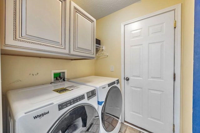 9128 Belvedere Ct, Florence, KY 41042 - washroom featuring washing machine and dryer and cabinet space