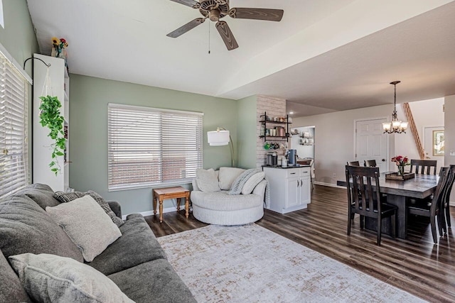9128 Belvedere Ct, Florence, KY 41042 - living area with ceiling fan, dark wood-style floors, and a chandelier