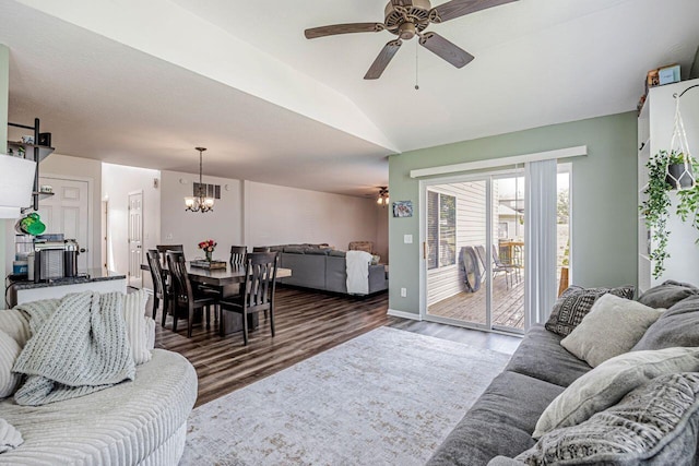 9128 Belvedere Ct, Florence, KY 41042 - living area featuring ceiling fan, wood finished floors, lofted ceiling, and a chandelier