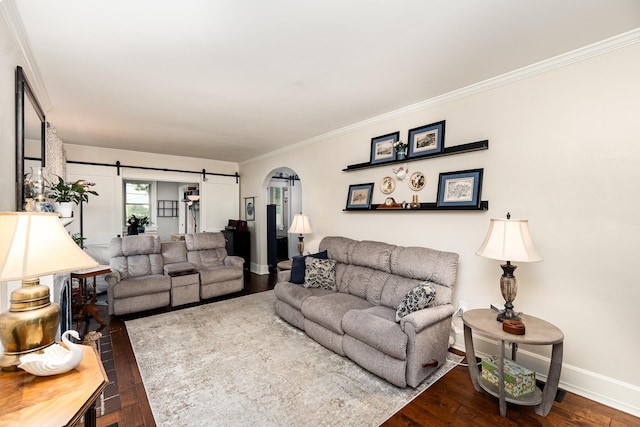 137 Robson Ave, Fort Thomas, KY 41075 - living room featuring dark wood finished floors, crown molding, arched walkways, and a barn door