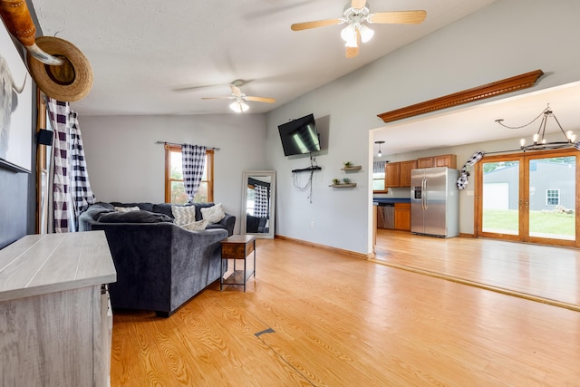 1041 Kidwell Rd, Demossville, KY 41033 - living room featuring ceiling fan, light wood finished floors, and a chandelier