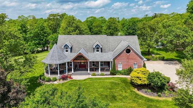 9015 Washington Trace Rd, California, KY 41007 - cape cod home featuring covered porch, a front lawn, and brick siding