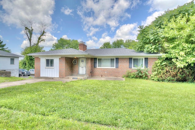 5370 Skyline Dr, Highland Heights, KY 41076 - ranch-style house with brick siding, a chimney, a front lawn, and board and batten siding