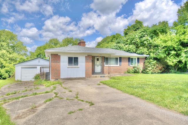 5370 Skyline Dr, Highland Heights, KY 41076 - view of front of home featuring brick siding, an outbuilding, a chimney, and concrete driveway